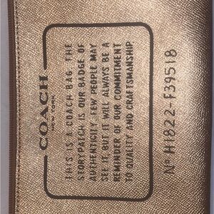 Coach story patch rose gold leather pouch/clutch